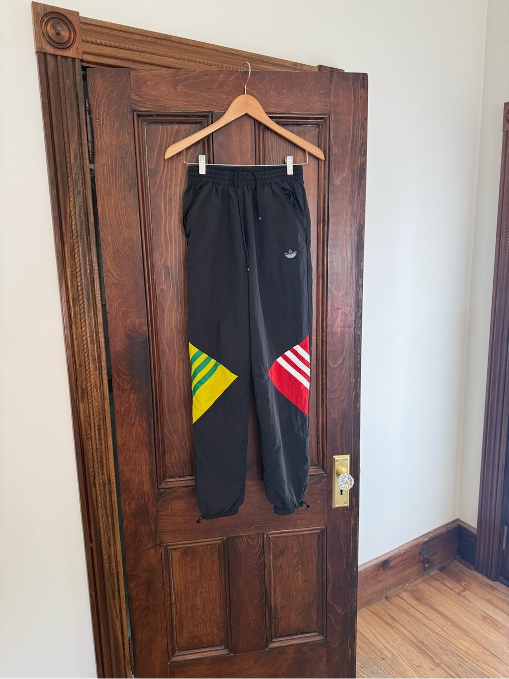 Adidas Black Sweatpants with Yellow-Green and Red Panels